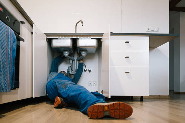 Professional Emergency Plumber technician working in Holliston, MA